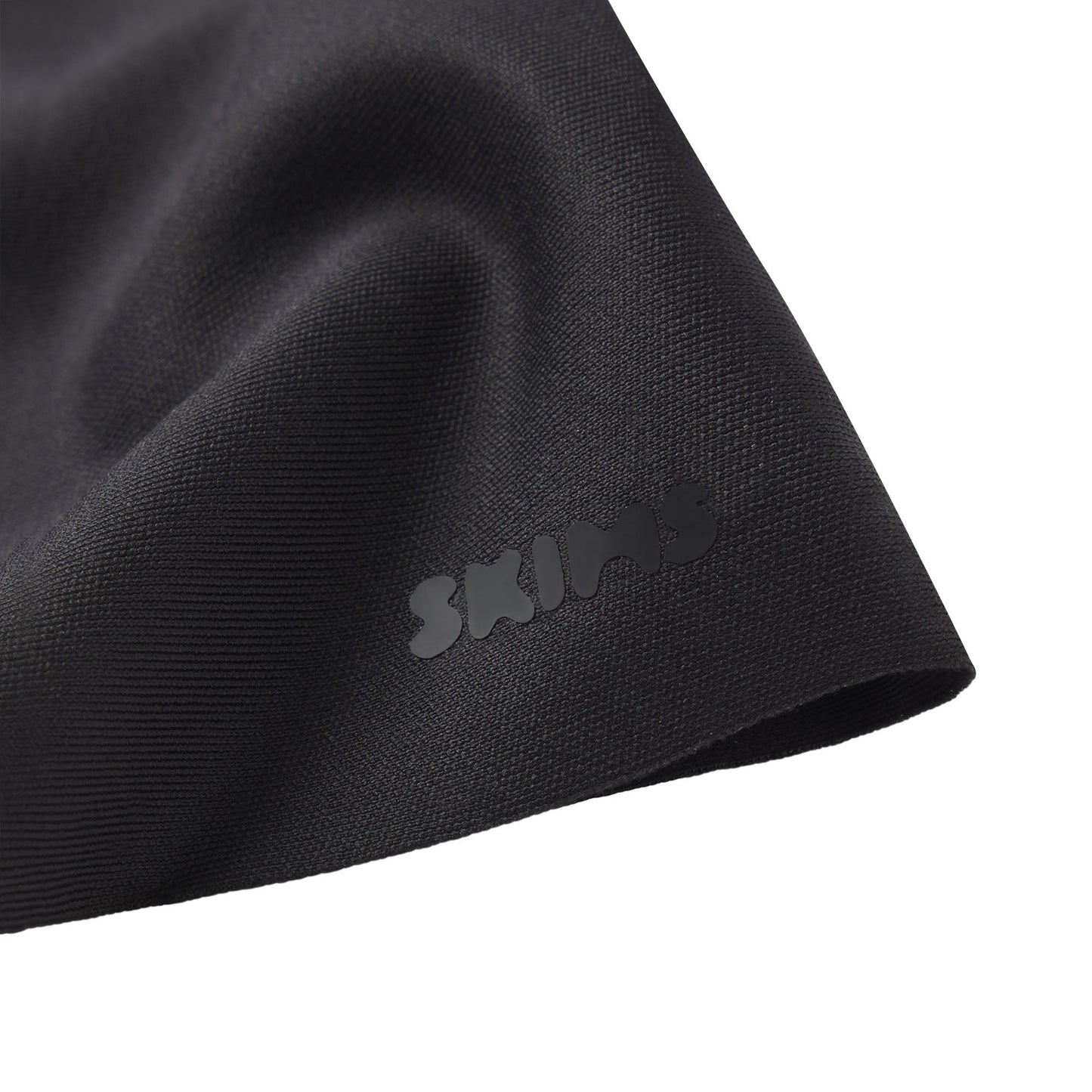 SKIMS BODY BUTT AND HIP ENHANCING MID THIGH SHORT | ONYX