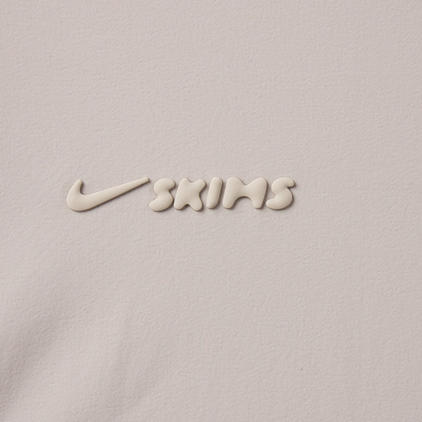 NikeSKIMS WOVEN NYLON CROP JACKET | STONE